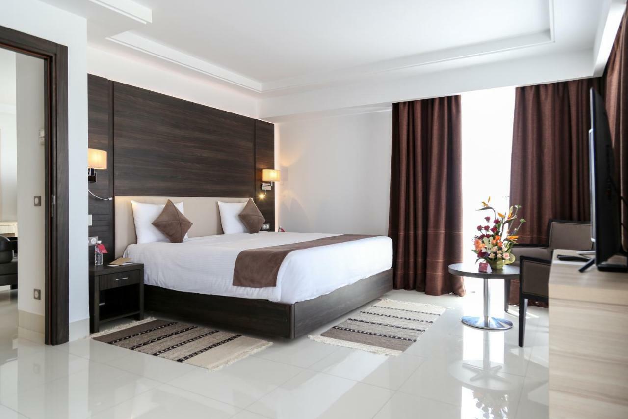 Radisson Hotel Sfax Esterno foto A bedroom at the hotel