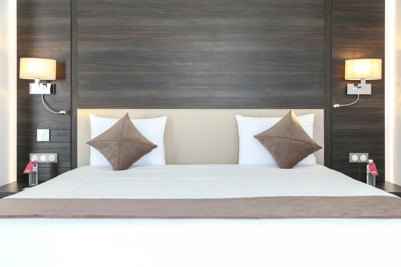 Radisson Hotel Sfax Esterno foto A bed