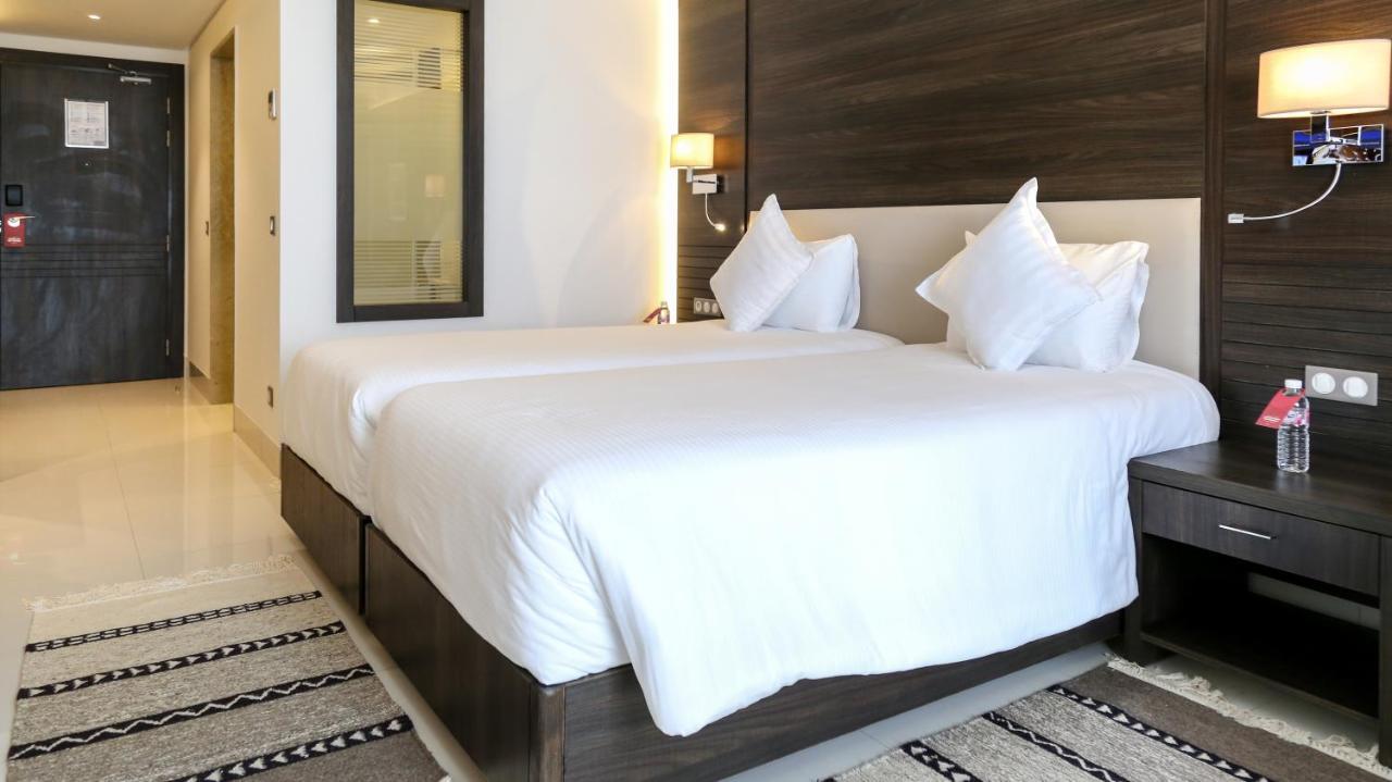Radisson Hotel Sfax Esterno foto A bedroom at the hotel